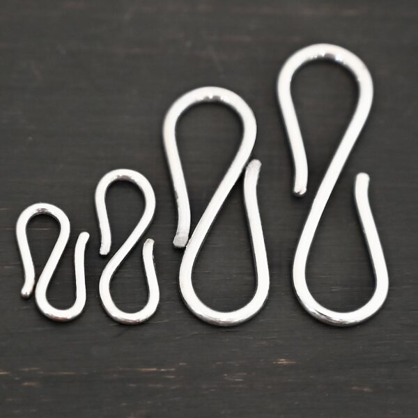 Simon S Clasp - shiny shown on dark background