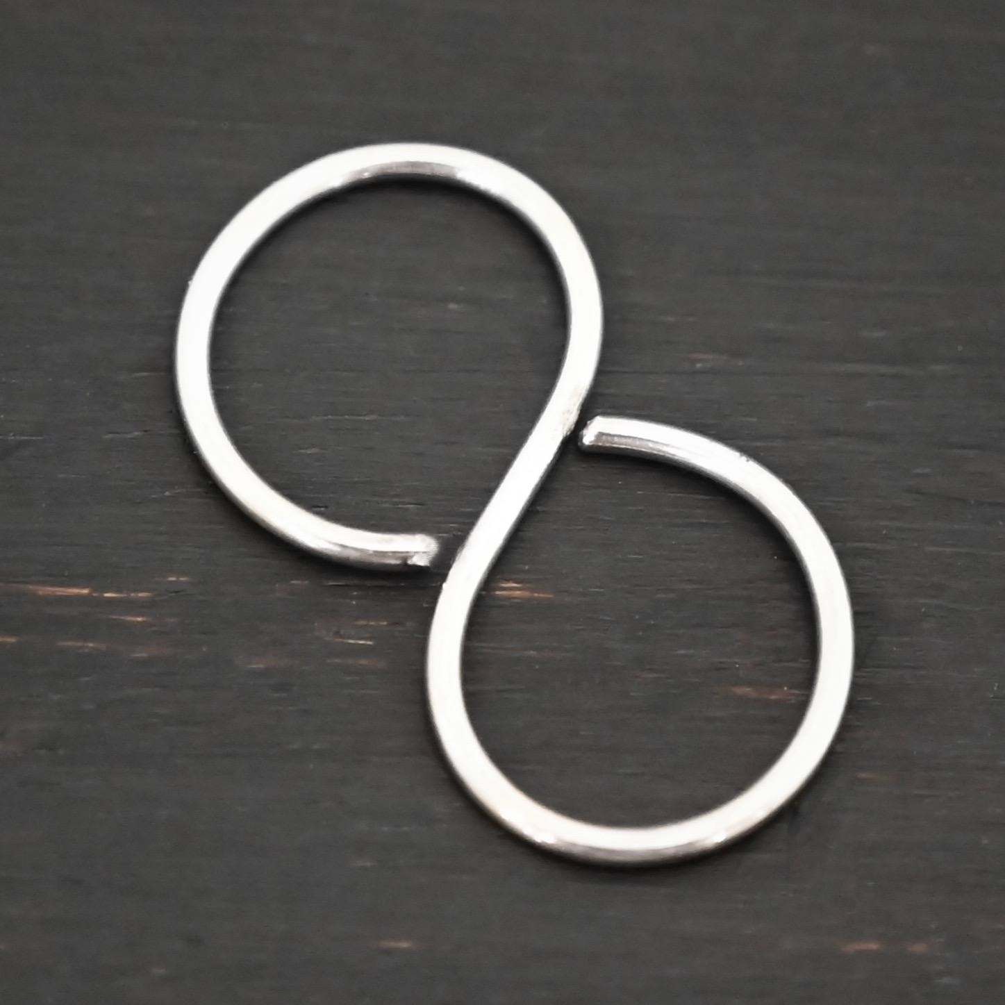 Sienna S Clasp - shiny shown on dark background