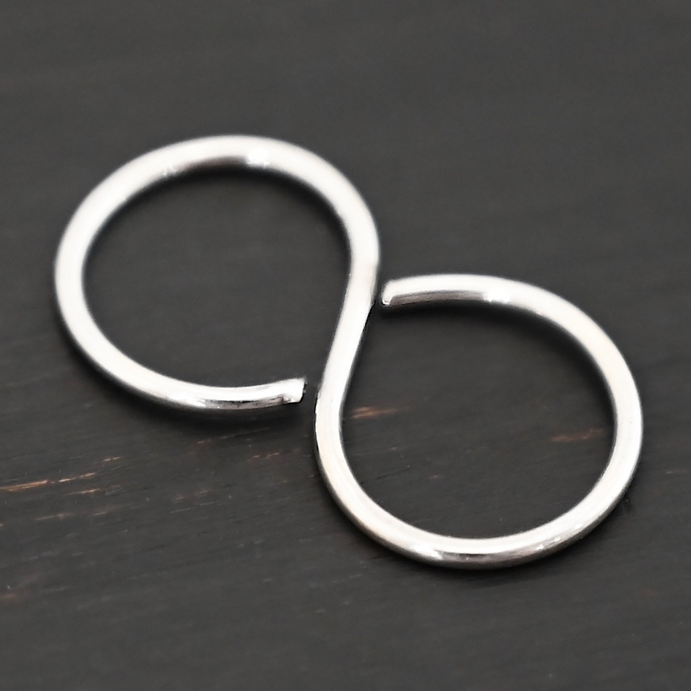 Sienna S Clasp - shiny shown on dark background