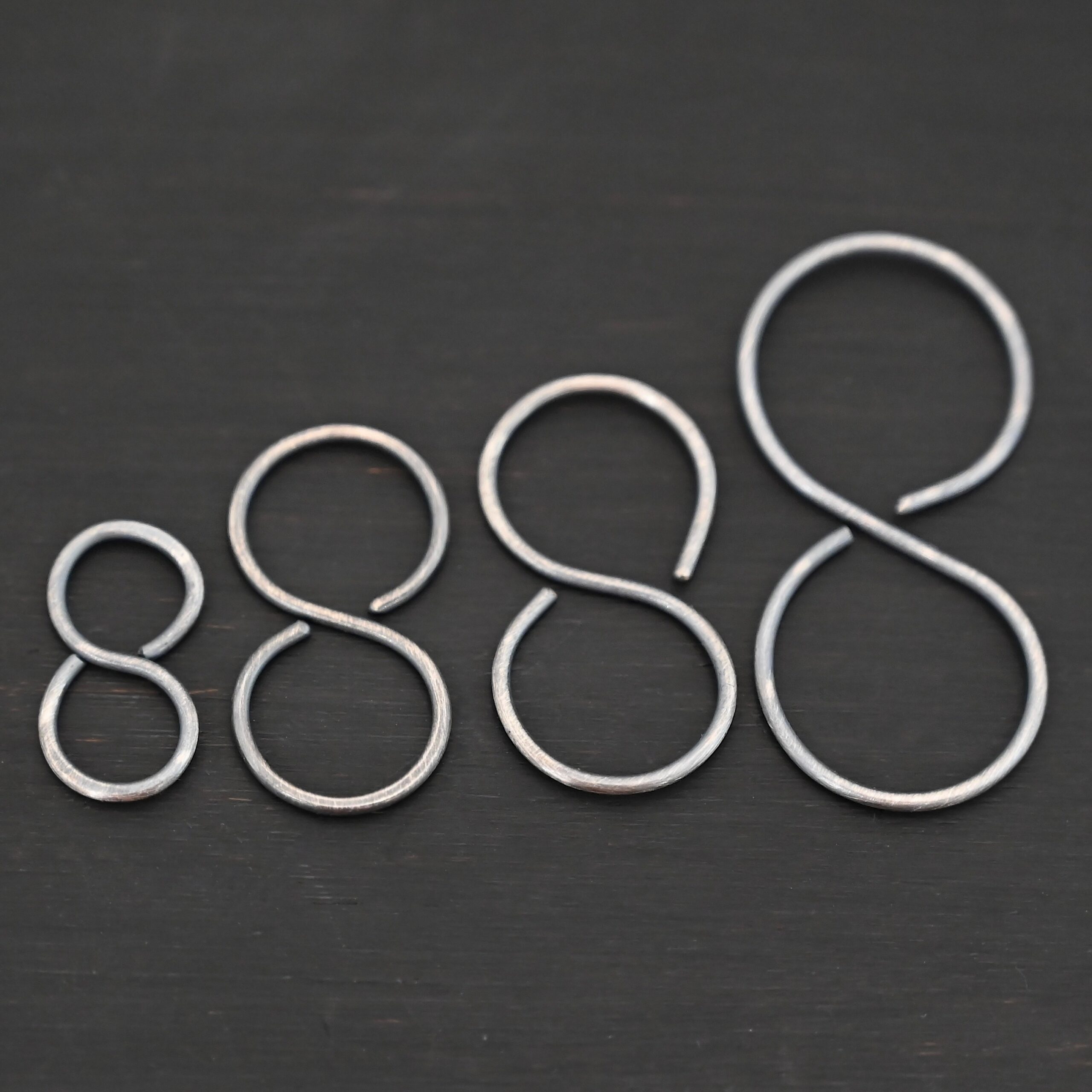 Sienna S Clasp - oxidized shown on dark background