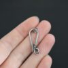 Hannah Clasp - oxidized shown in hand