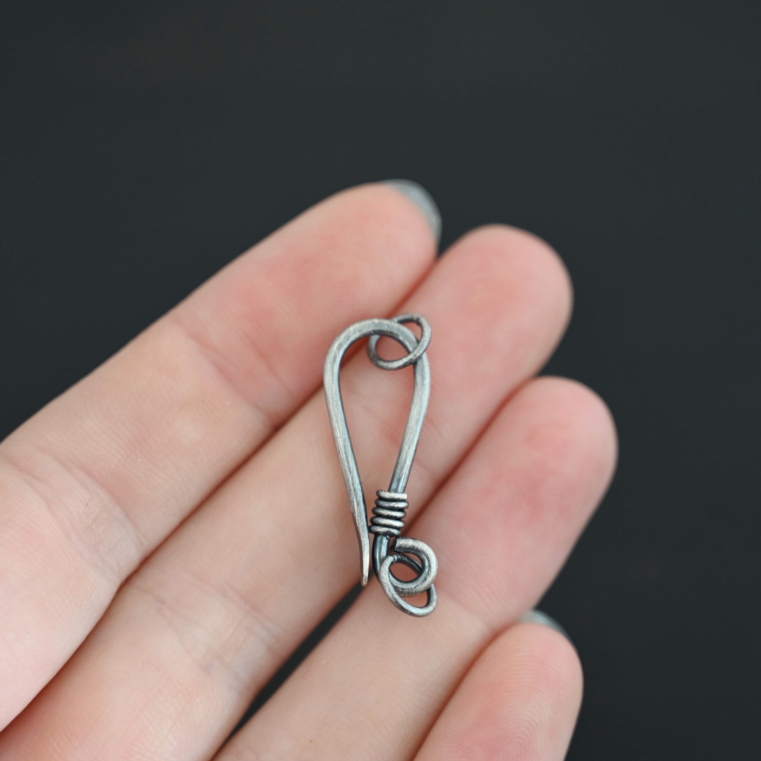 Hannah Clasp - oxidized Hannah Clasp - oxidized shown in hand