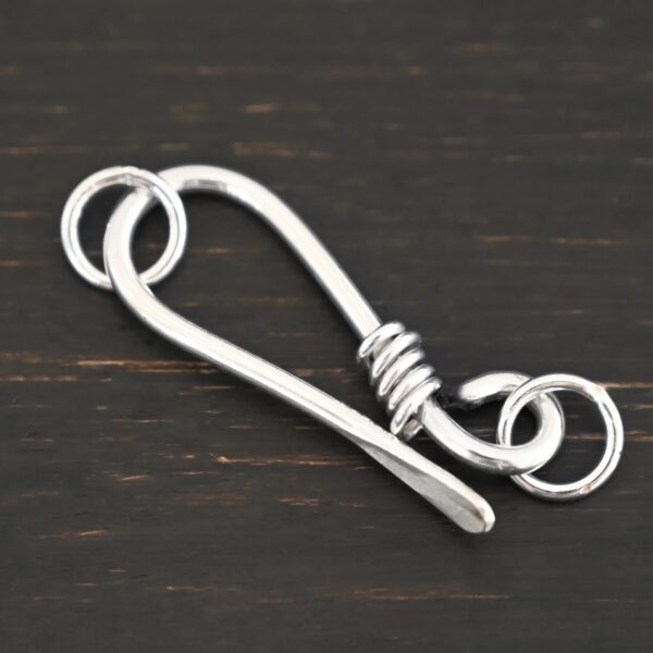 Hannah Clasp - shiny shown on dark background