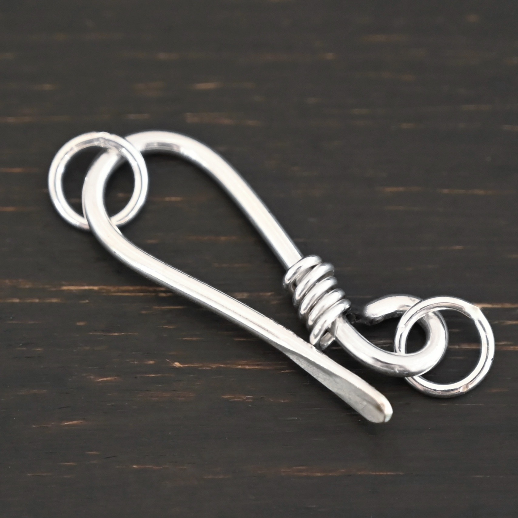 Hannah Clasp - shiny Hannah Clasp - shiny shown on dark background