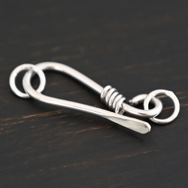 Hannah Clasp - shiny shown on dark background