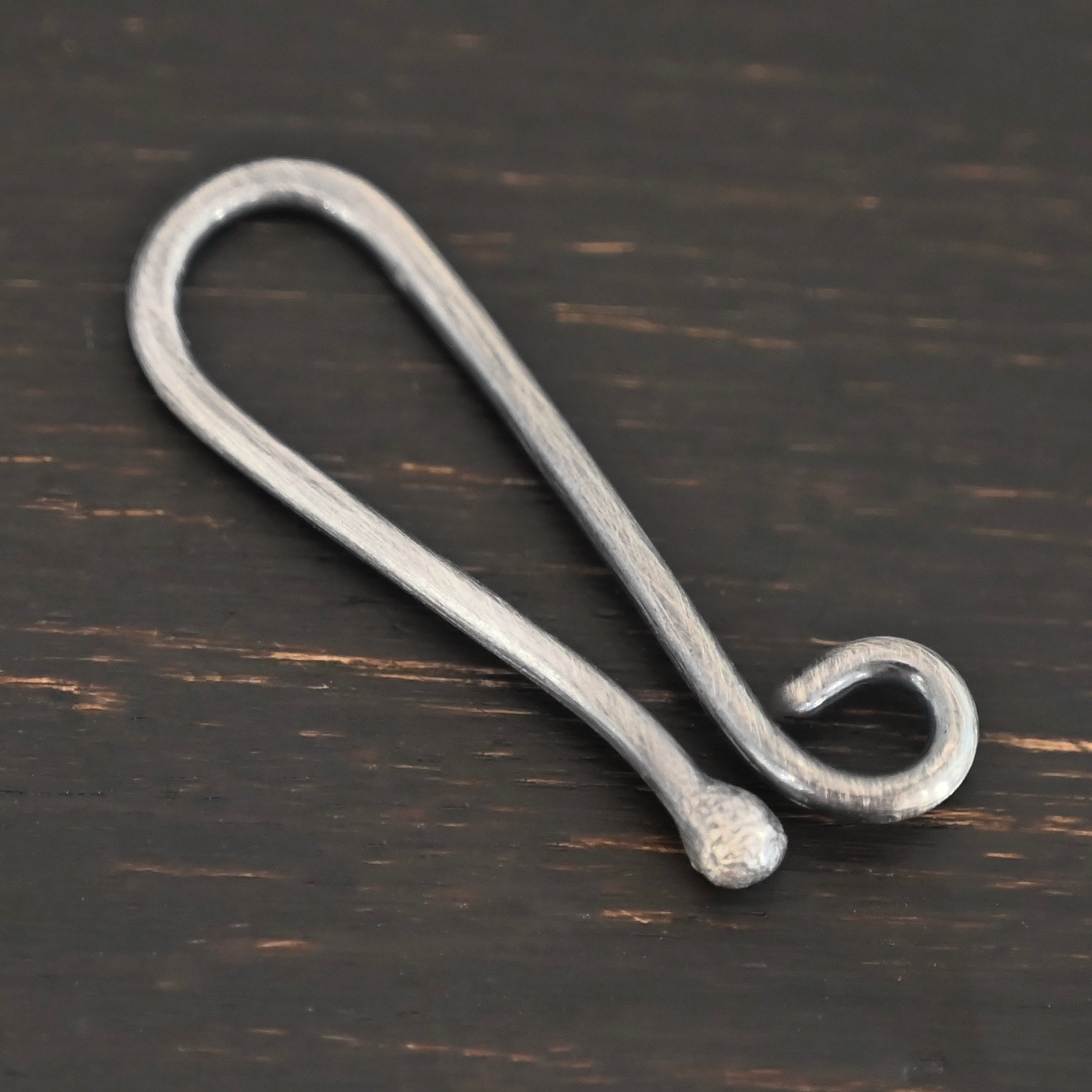 Hazel Hook Clasp - oxidized shown on dark background