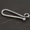 Hazel Hook Clasp - oxidized shown on dark background