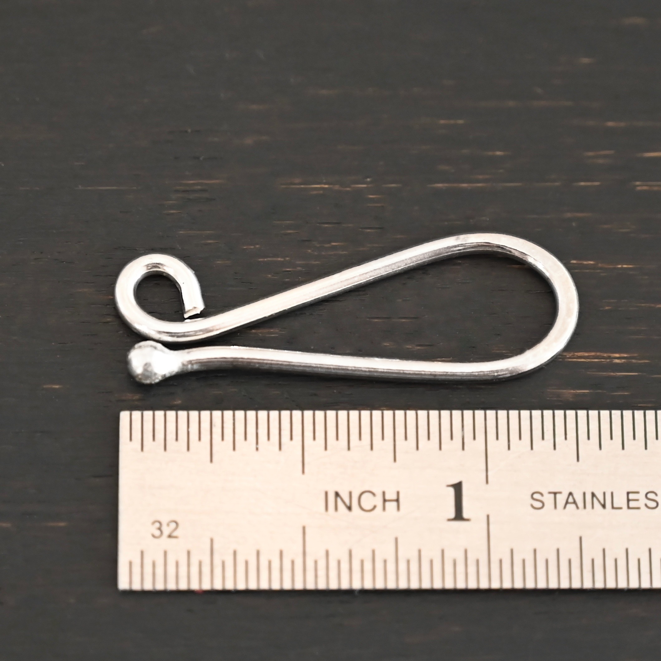 Hazel Hook Clasp - shiny shown by ruler