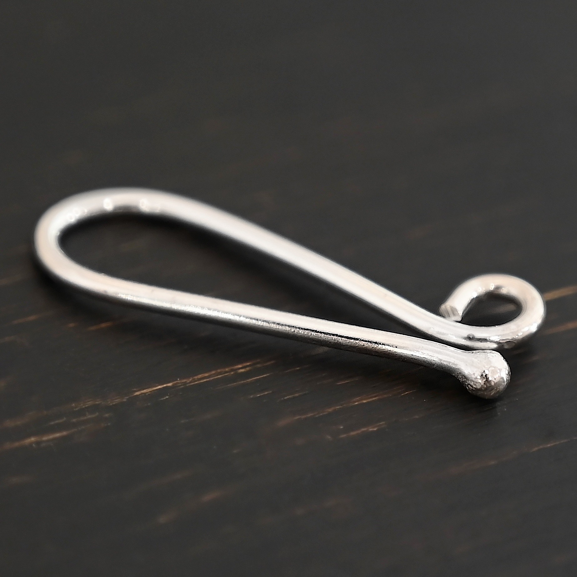 Hazel Hook Clasp - shiny shown on dark background