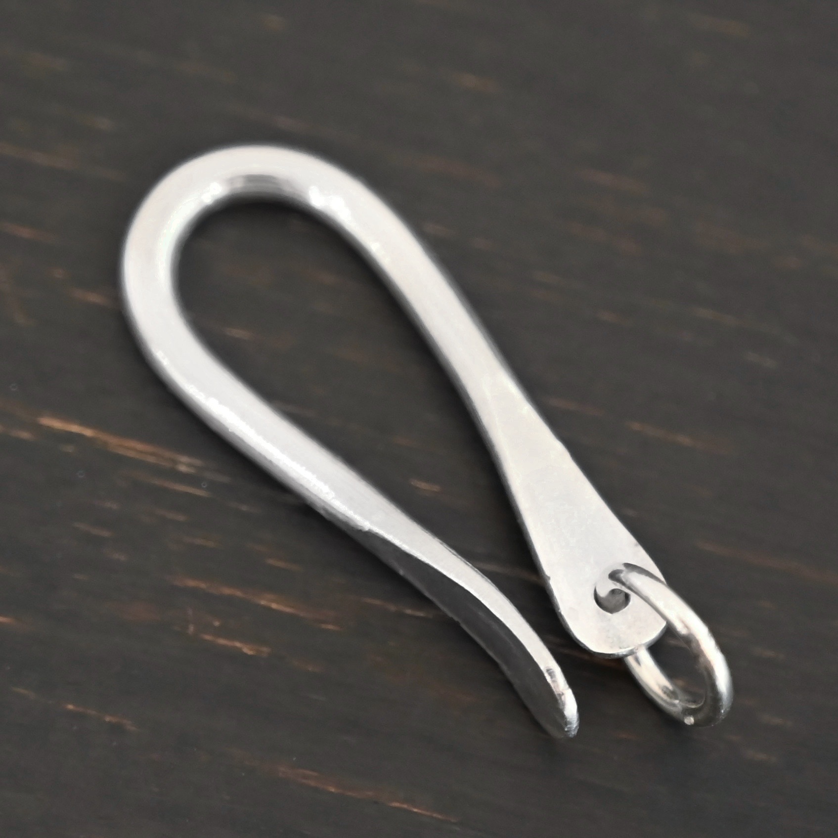 Harrison Hook Clasp - shiny Harrison Hook Clasp - shiny shown on dark background