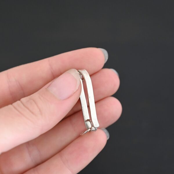 Hudson Hook Clasp - shiny shown in hand