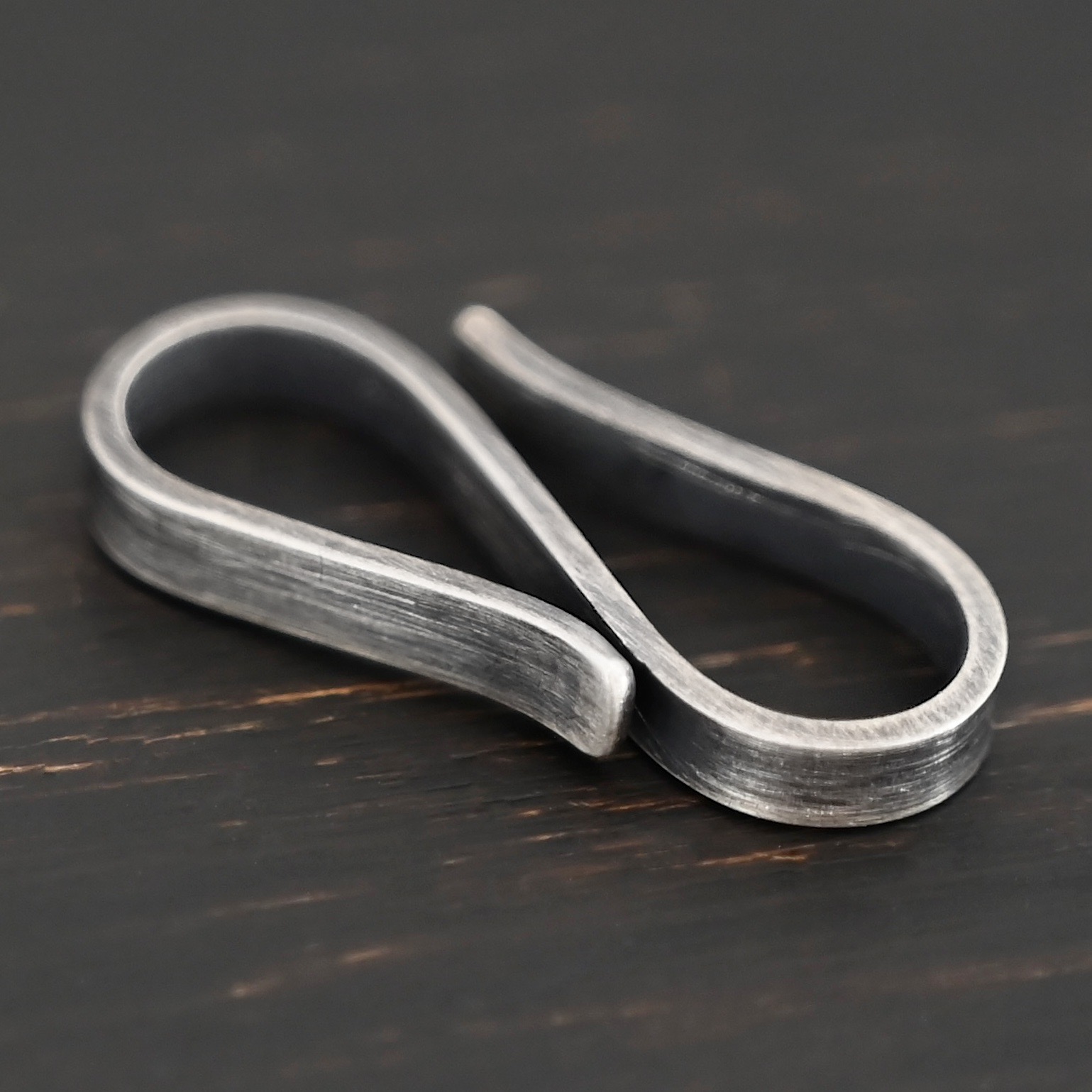 Stetson S Clasp - oxidized shown on dark background