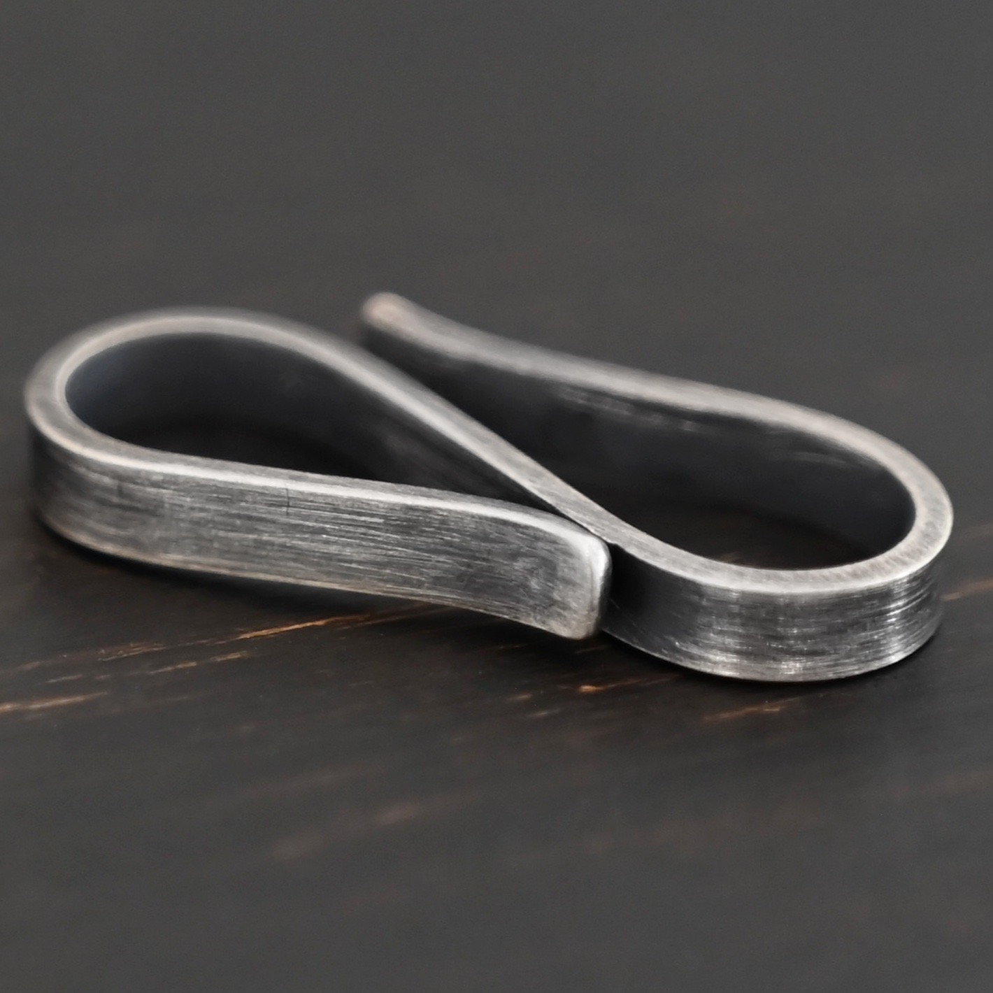 Stetson S Clasp - oxidized shown on dark background
