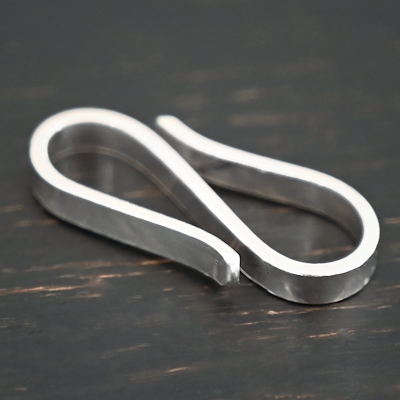 Stetson S Clasp - shiny shown on dark background