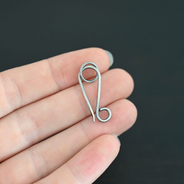 Hillary Hook Clasp - oxidized shown in hand
