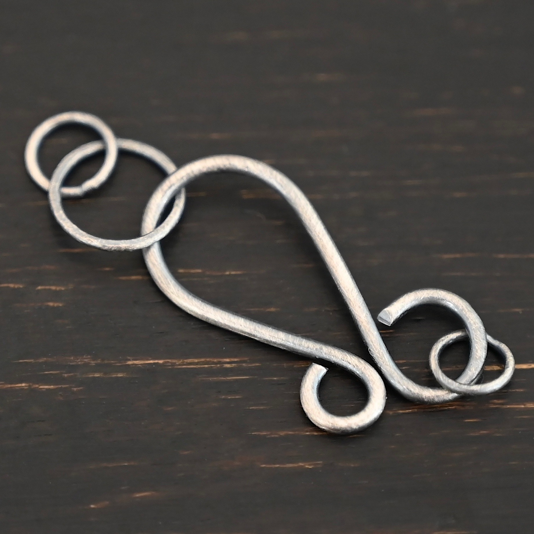 Harmony Hook Clasp - oxidized shown on dark background