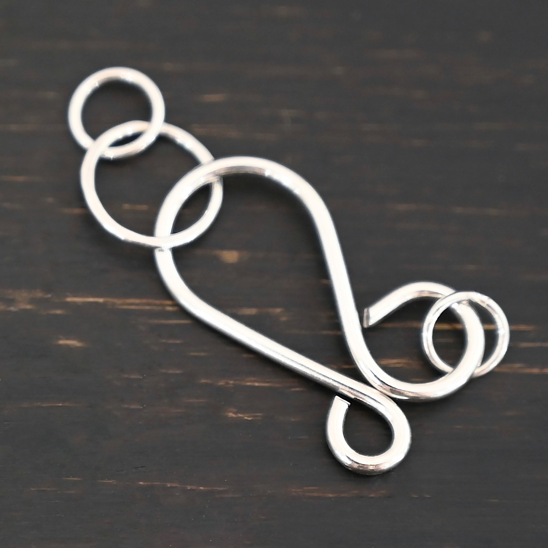 Harmony Hook Clasp - shiny shown on dark background