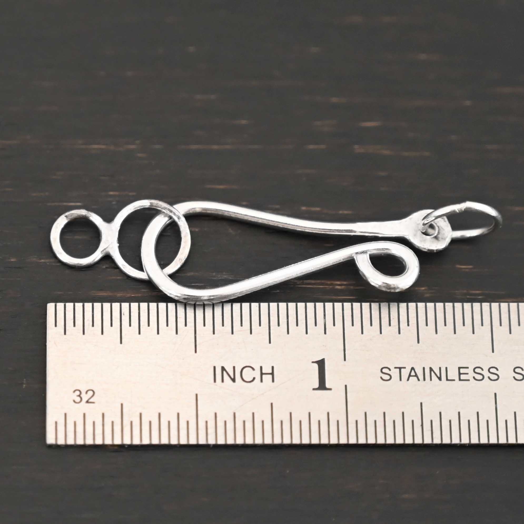 Haylee Hook Clasp - shiny shown by ruler