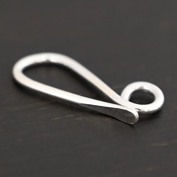 Hattie Hook Clasp - shiny shown on dark background