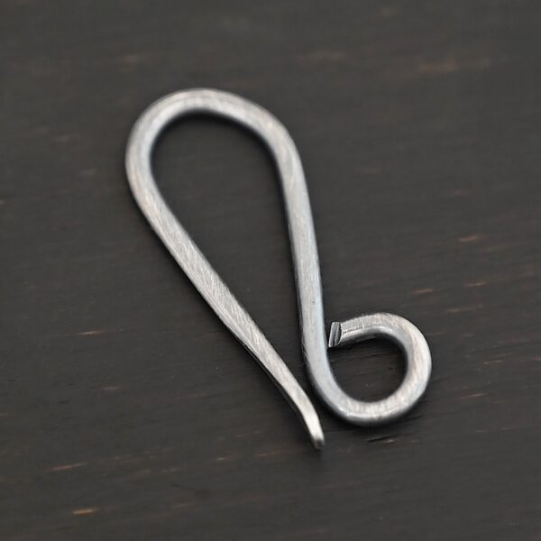 Hattie Hook Clasp - oxidized shown on dark background