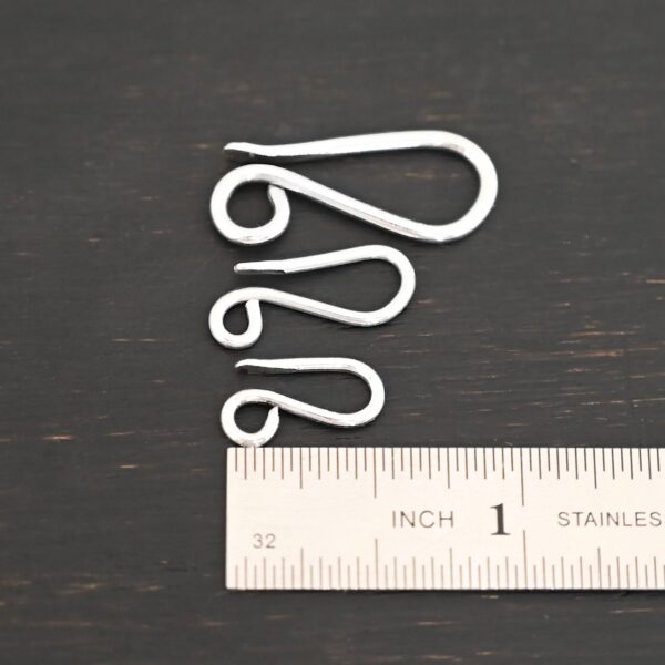 Hattie Hook Clasp - shiny shown by ruler