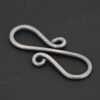 Summer S Clasp - oxidized smooth shown on dark background