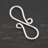Summer S Clasp - shiny smooth shown on dark background