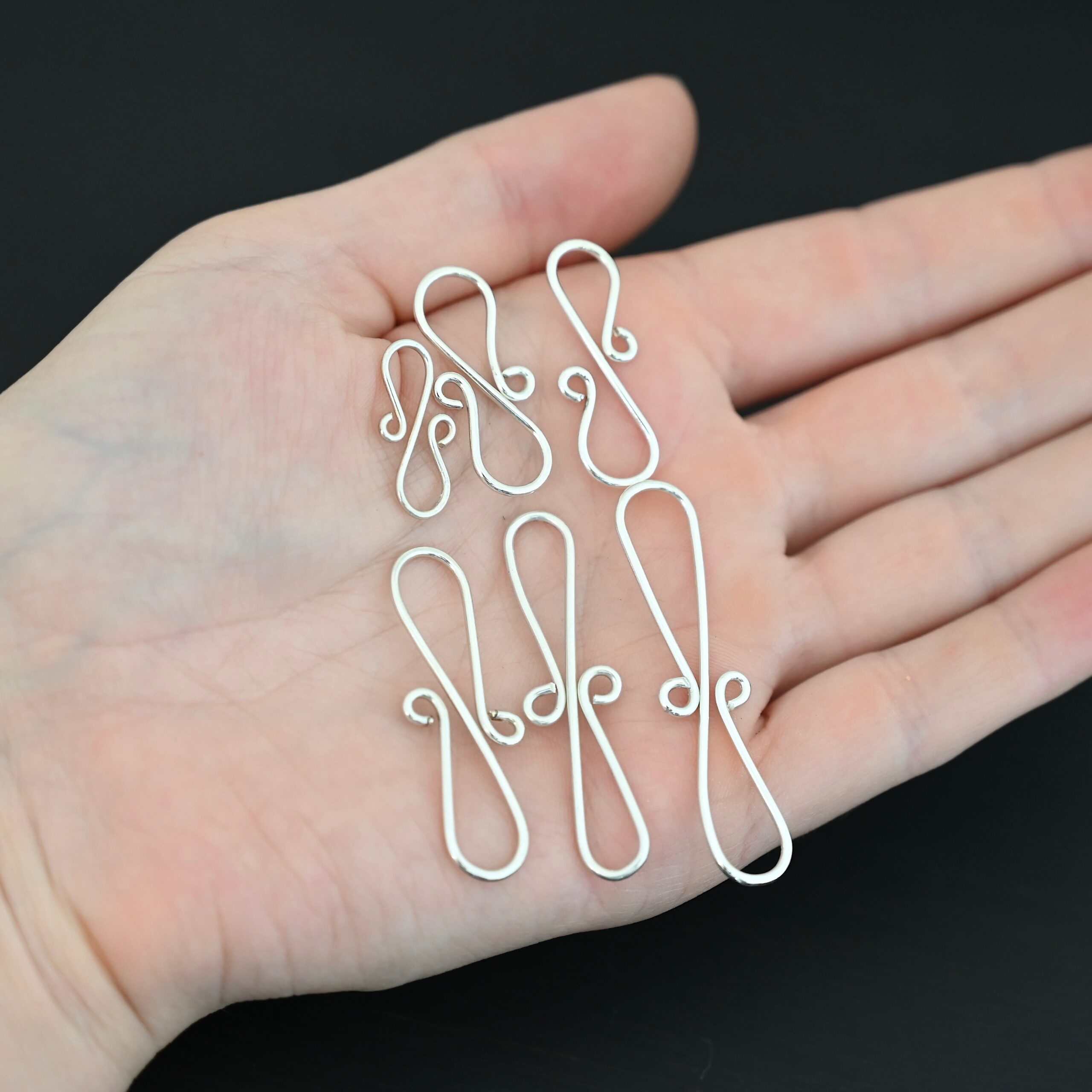 Summer S Clasp - shiny smooth shown in hand