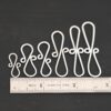 Summer S Clasp - shiny smooth shown by ruler