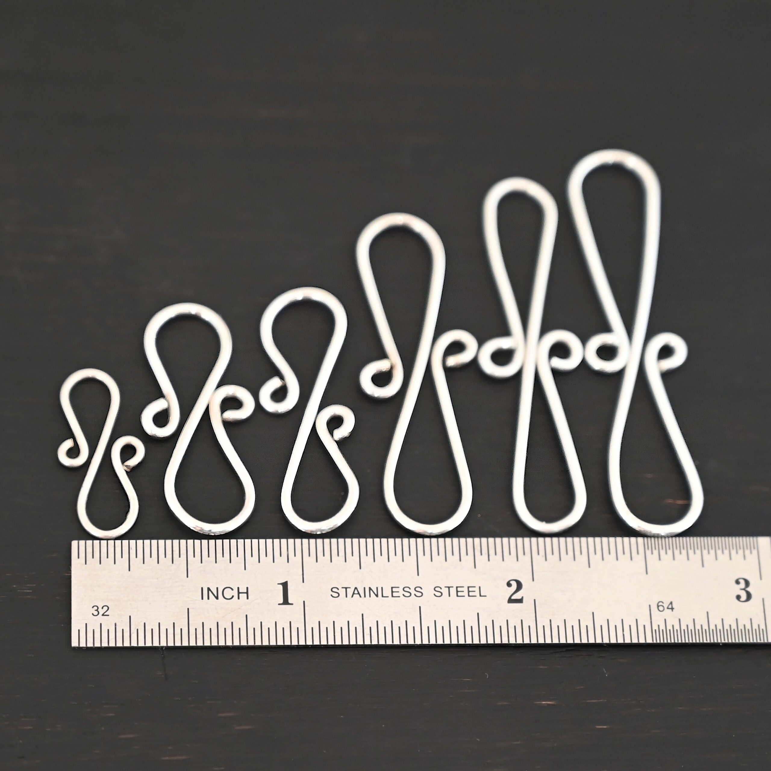 Summer S Clasp - shiny smooth shown by ruler