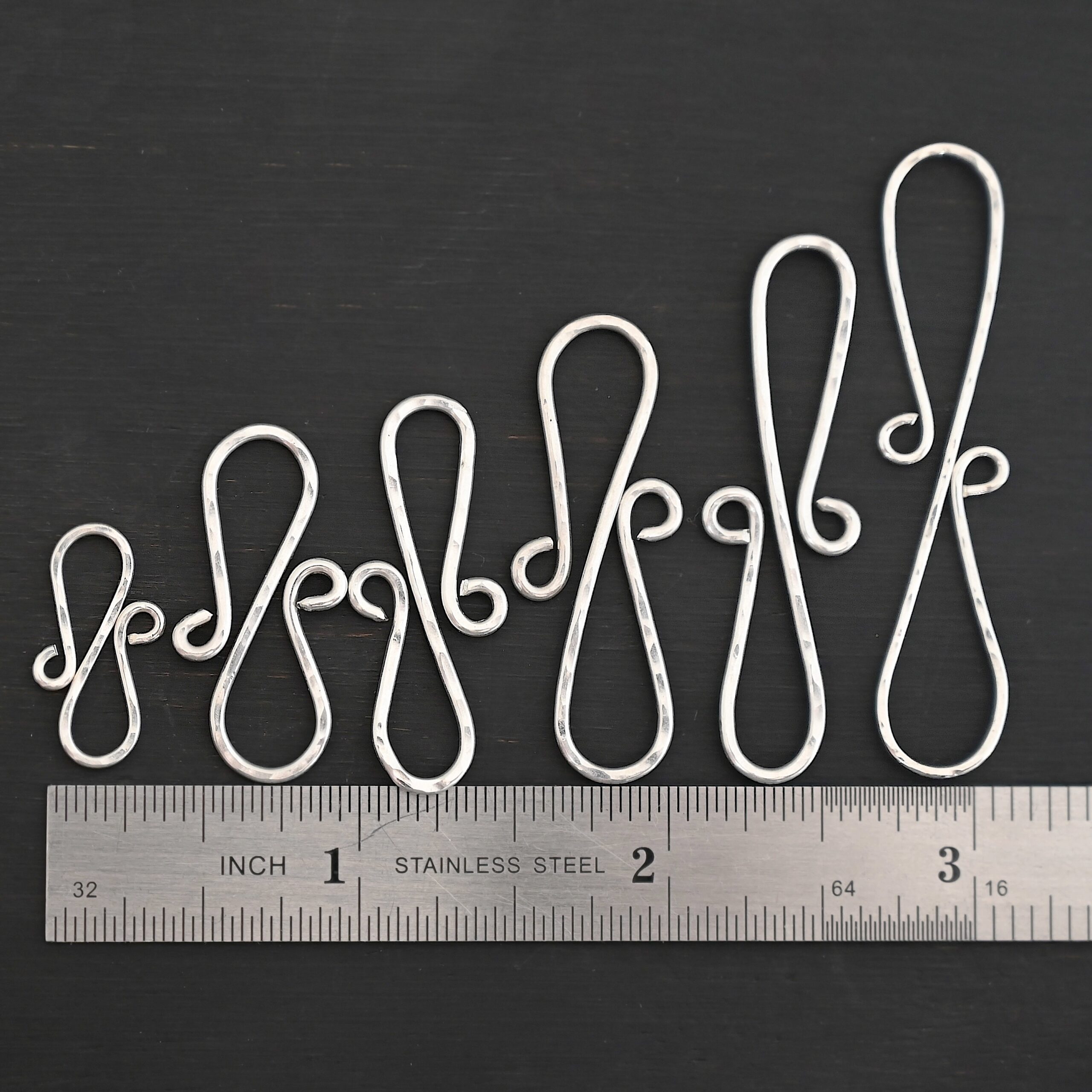 Summer S Clasp - shiny hammered shown by ruler