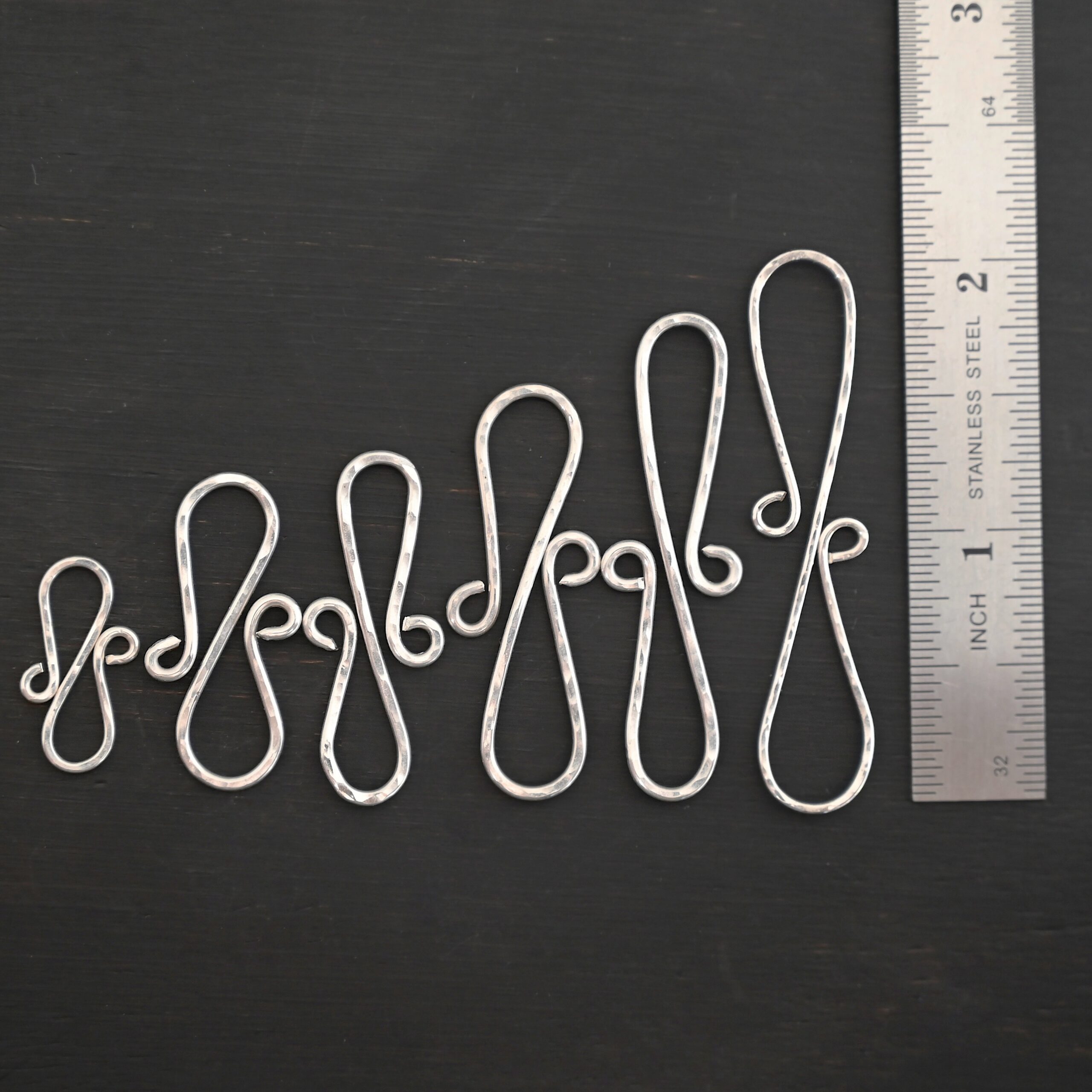 Summer S Clasp - shiny hammered shown by ruler