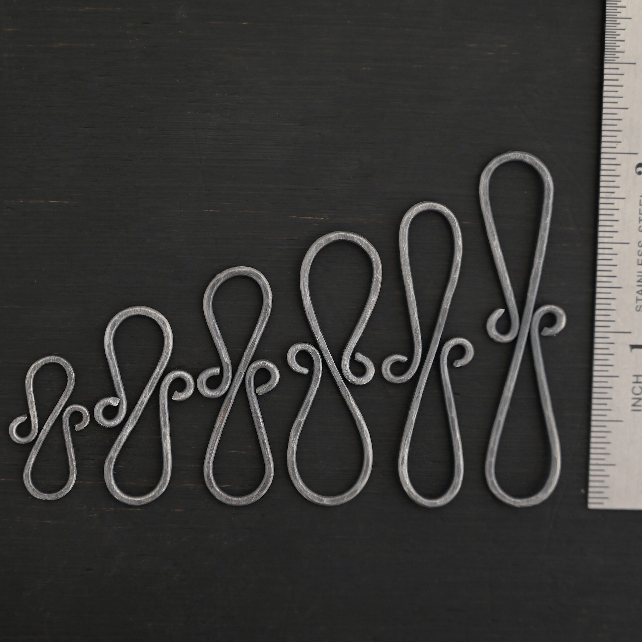 Summer S Clasp - oxidized hammered shown by ruler