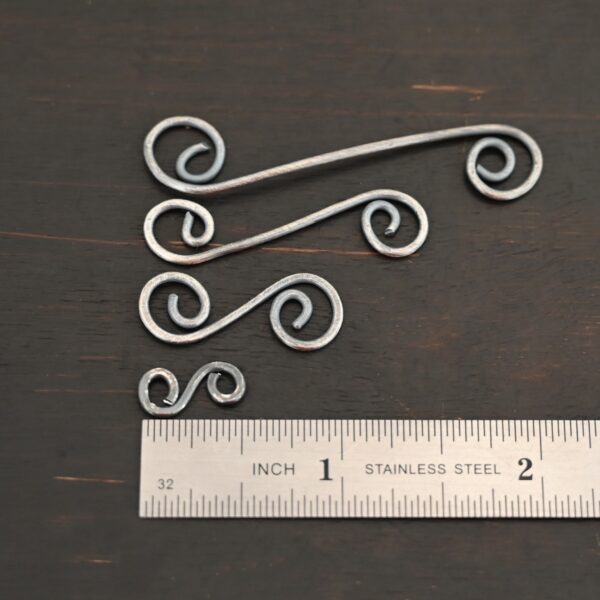 Hammered Swirl Finding - oxidized shown by ruler