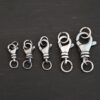 Sammy Swivel Lobster Claw - oxidized open shown on dark background