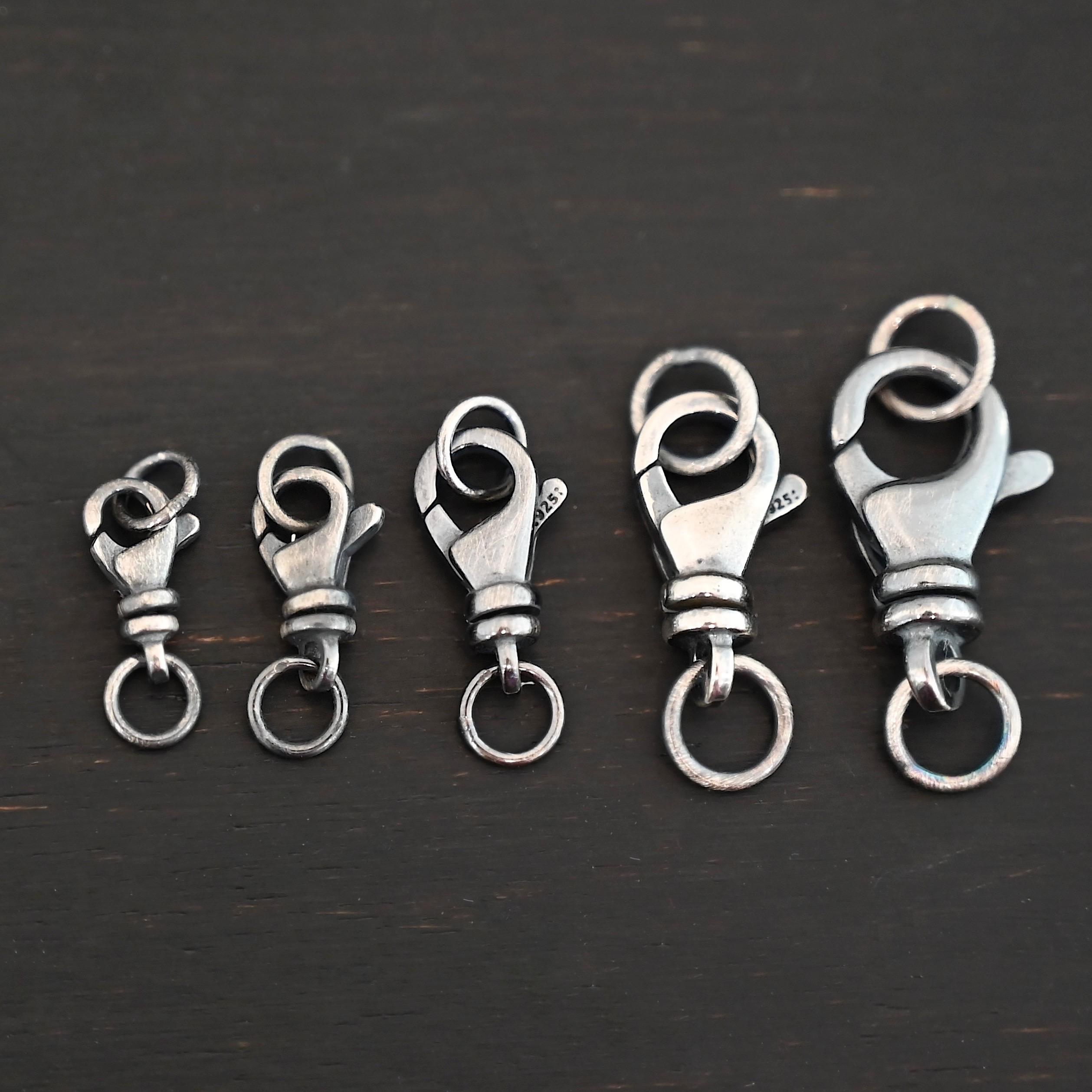 Sammy Swivel Lobster Claw - oxidized closed shown on dark background