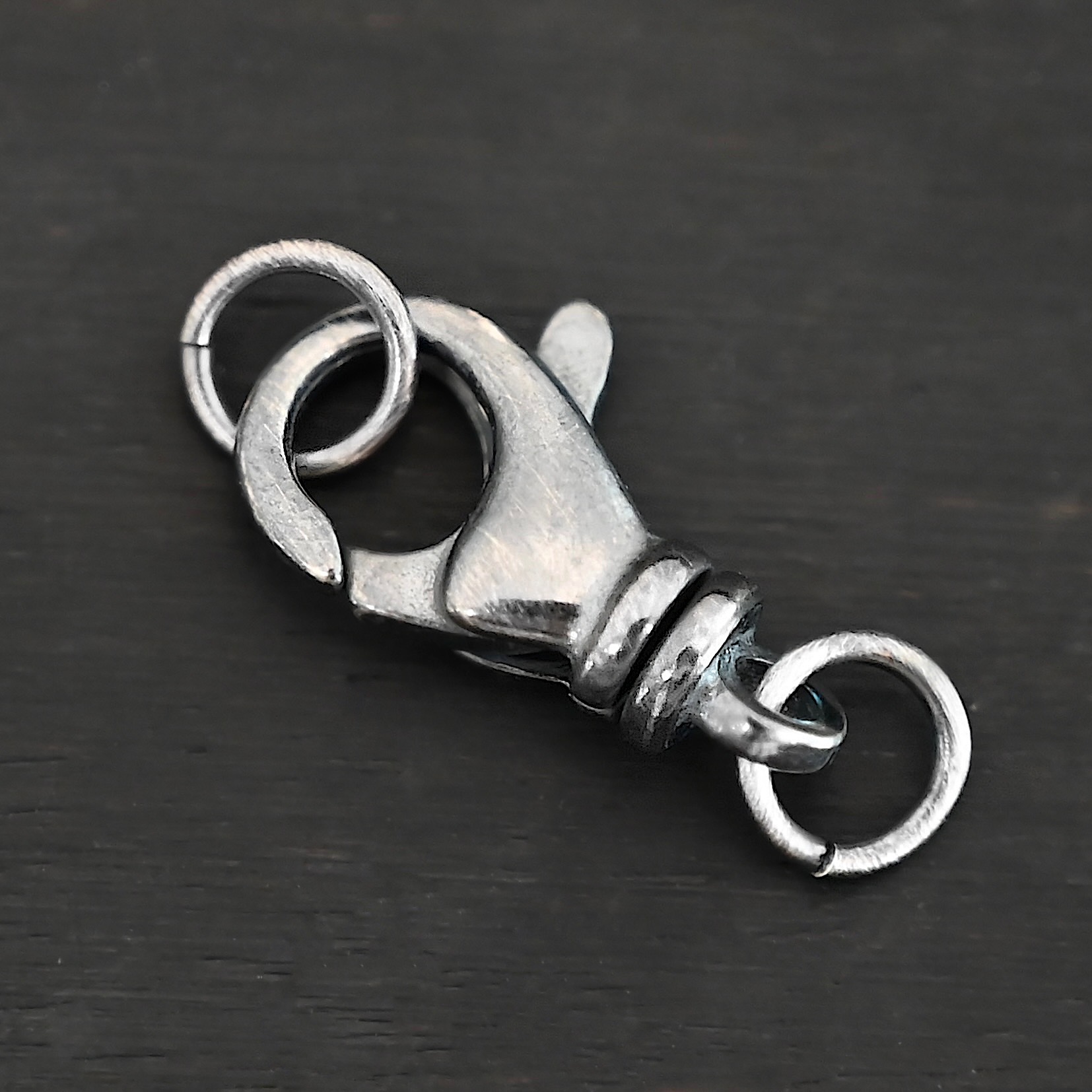 Sammy Swivel Lobster Claw - oxidized open JR shown on dark background