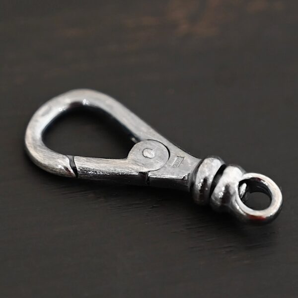 Sage Swivel Lobster Claw Clasp - 27mm oxidized shown on dark background