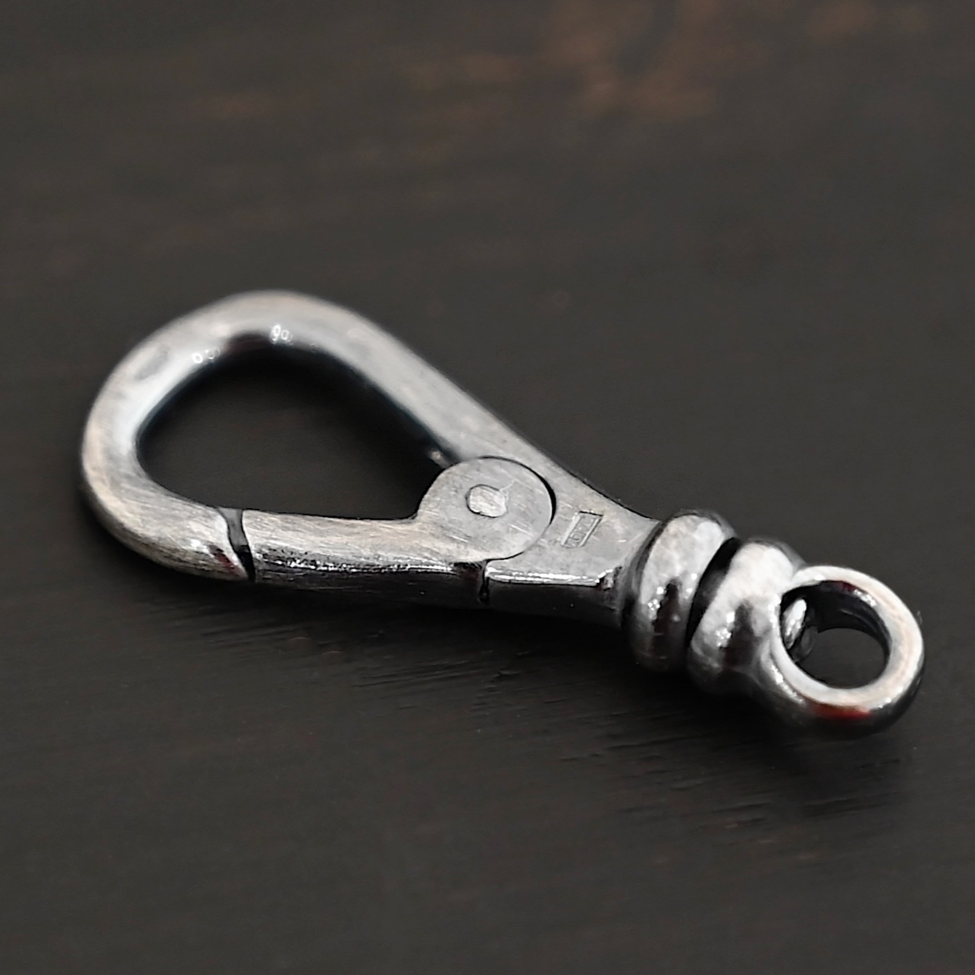 Sage Swivel Lobster Claw Clasp - 27mm oxidized shown on dark background