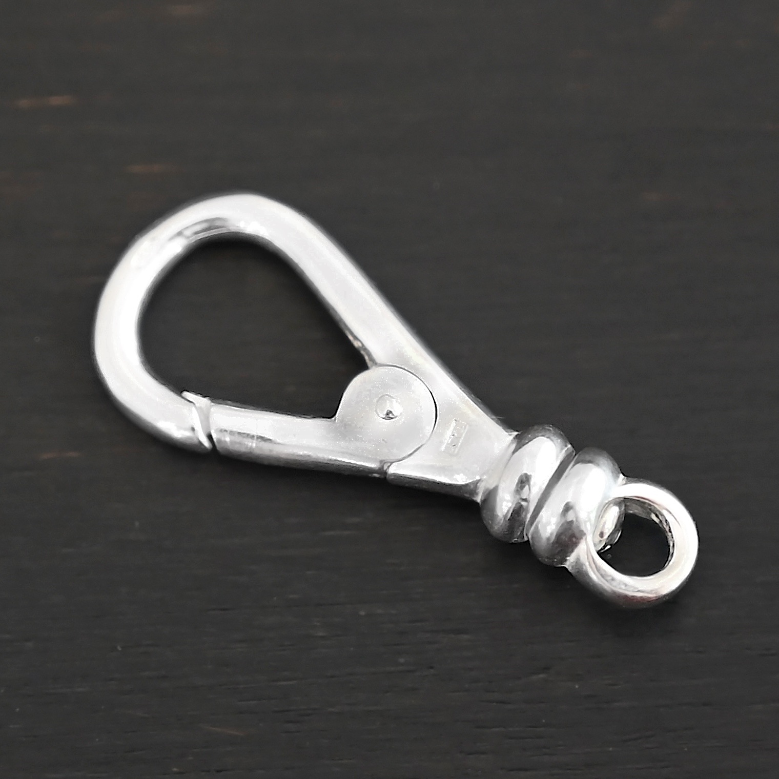 Sage Swivel Lobster Claw Clasp - 27mm shiny shown on dark background