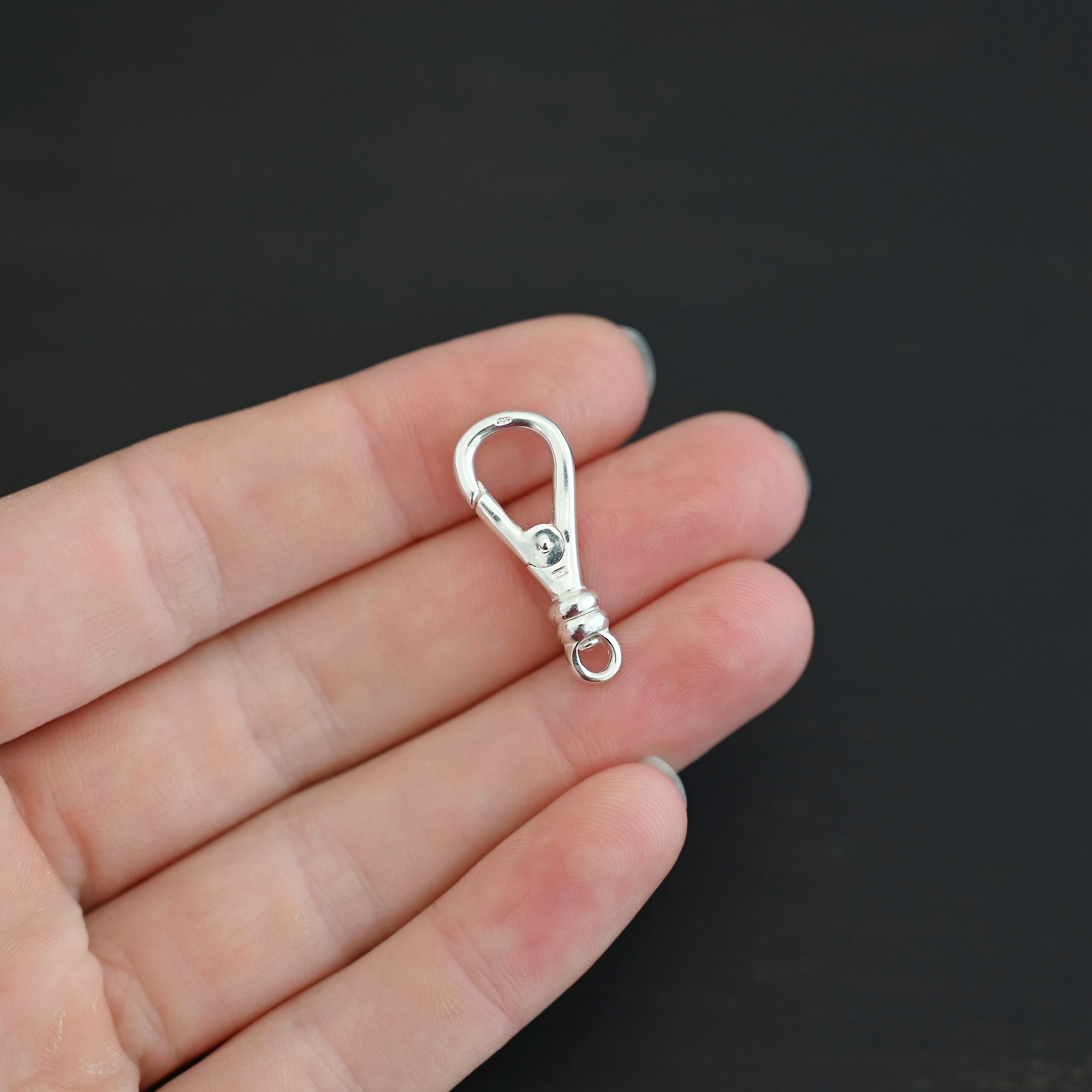 Sage Swivel Lobster Claw Clasp - 27mm shiny shown in hand