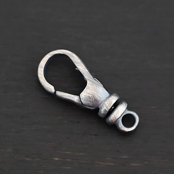 Sage Swivel Lobster Claw Clasp - 16mm oxidized shown on dark background