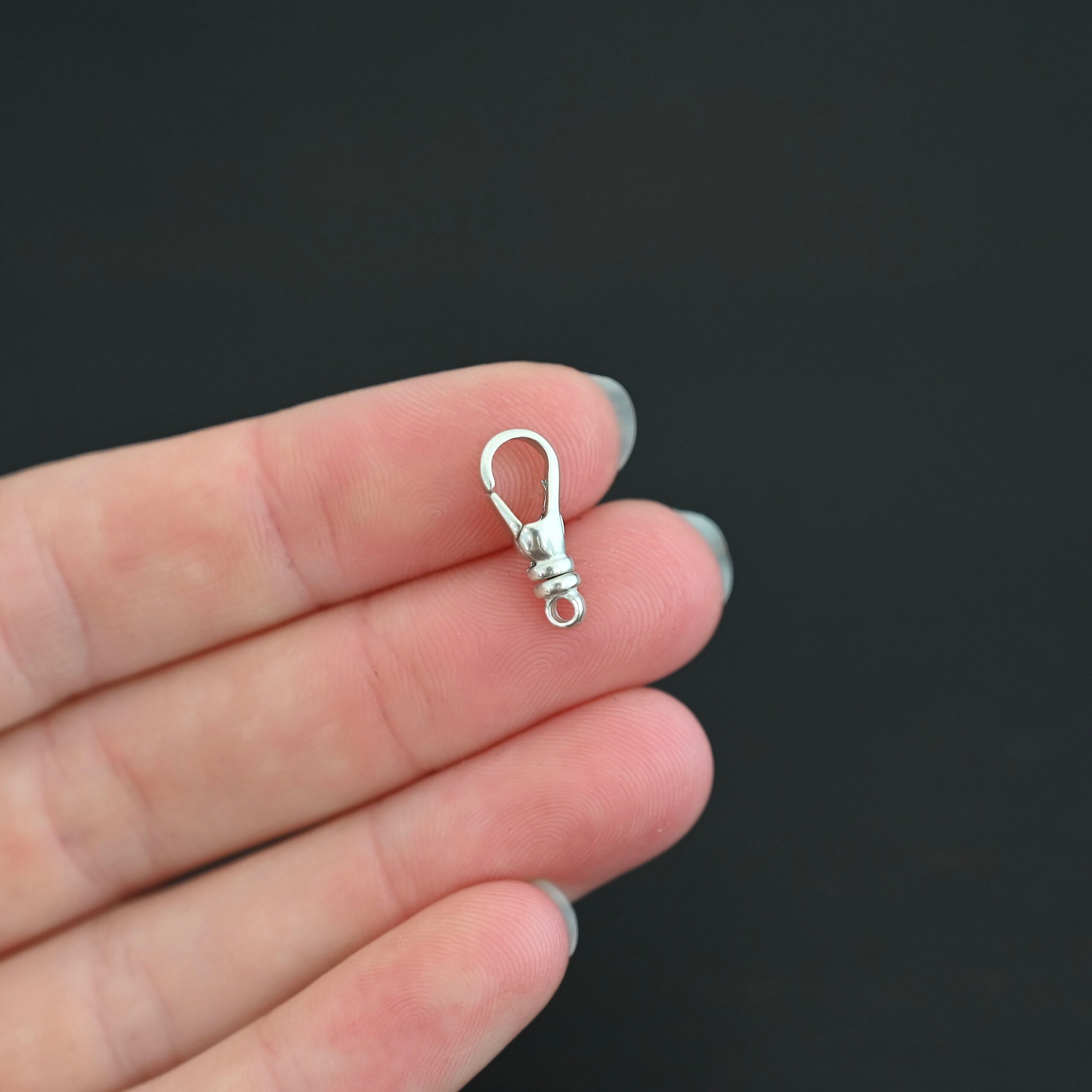 Sage Swivel Lobster Claw Clasp - 16mm shiny shown in hand