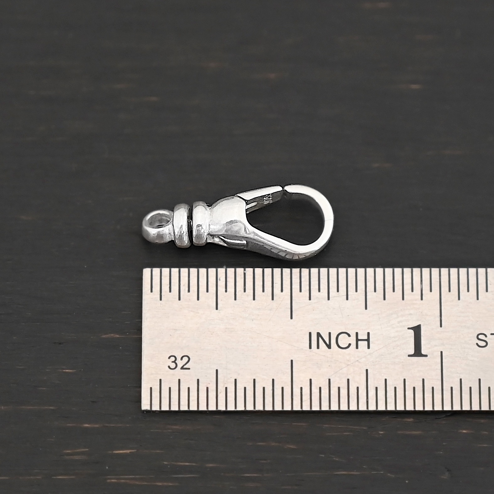 Sage Swivel Lobster Claw Clasp - 16mm shiny shown by ruler
