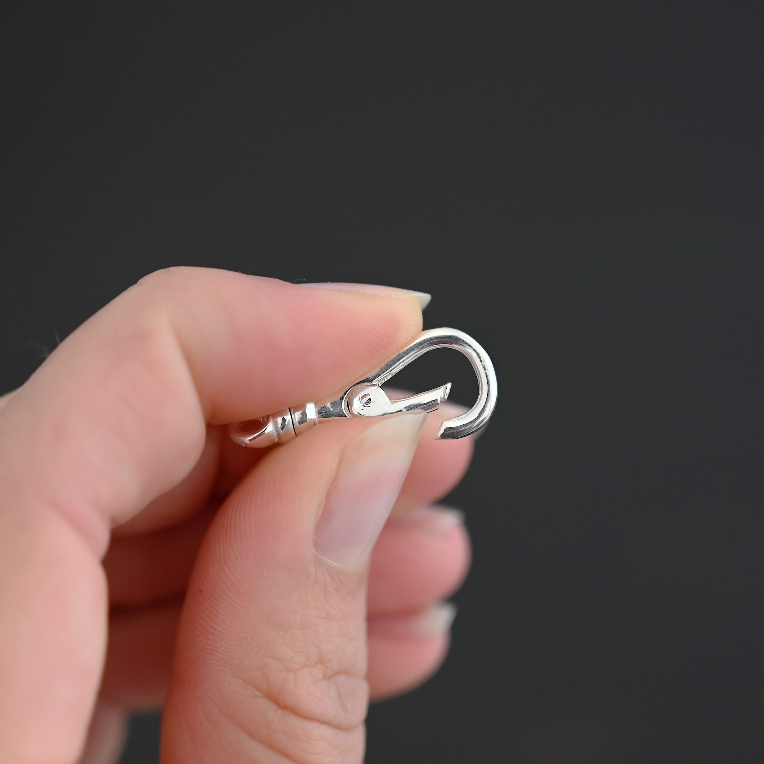 Sage Swivel Lobster Claw Clasp - 27mm shiny shown in hand