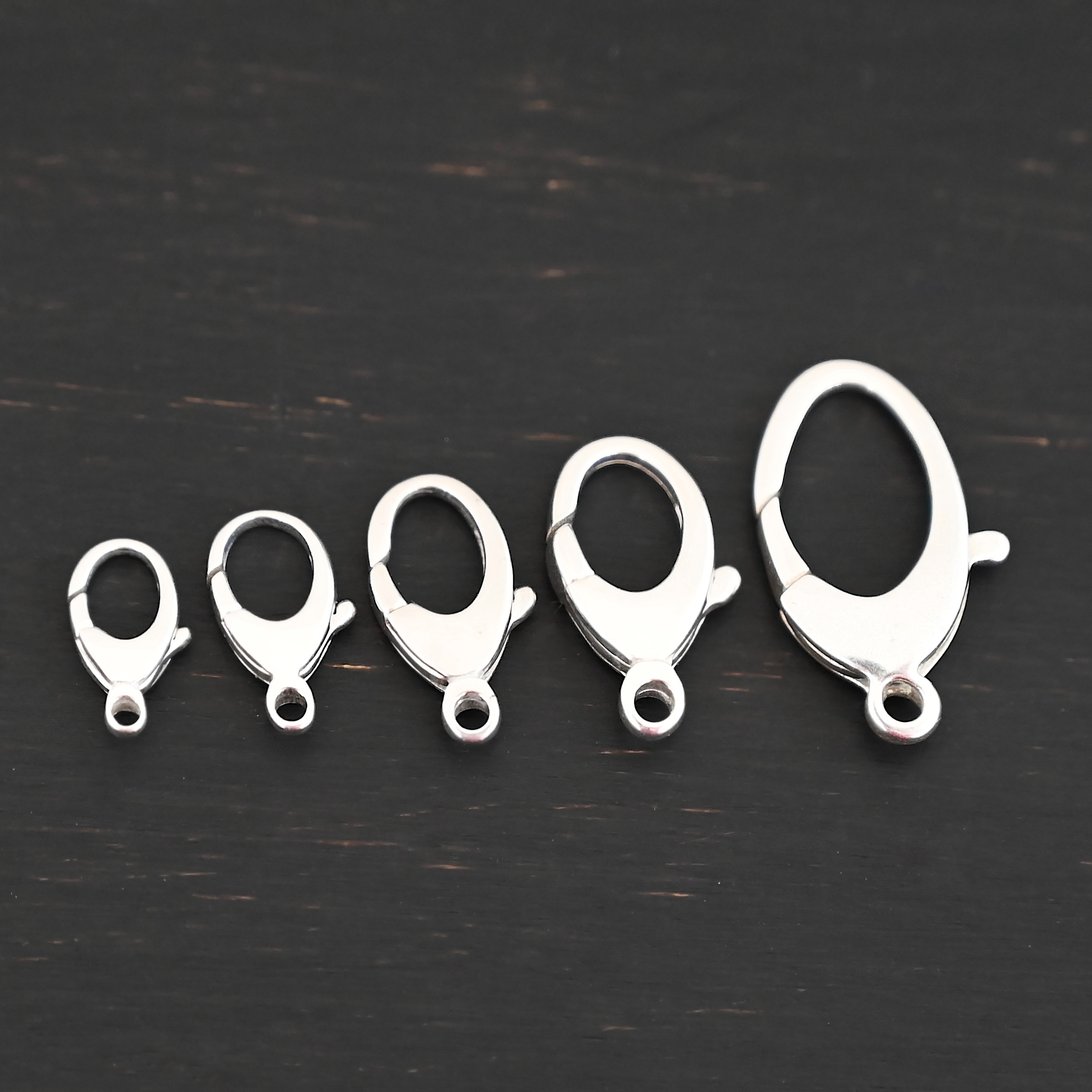 Luna Lobster Claw Clasp - shiny shown on dark background