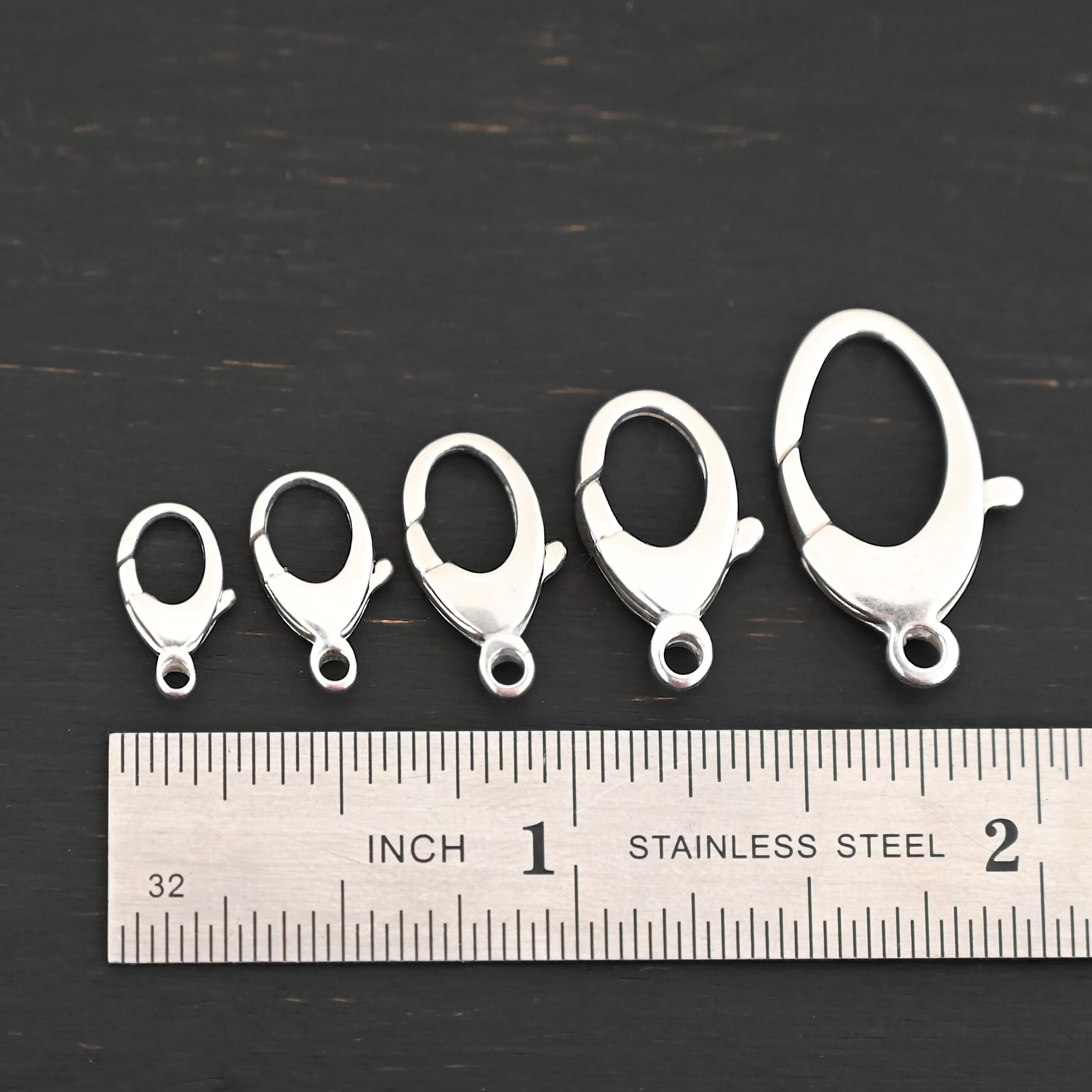 Luna Lobster Claw Clasp - shiny shown by ruler