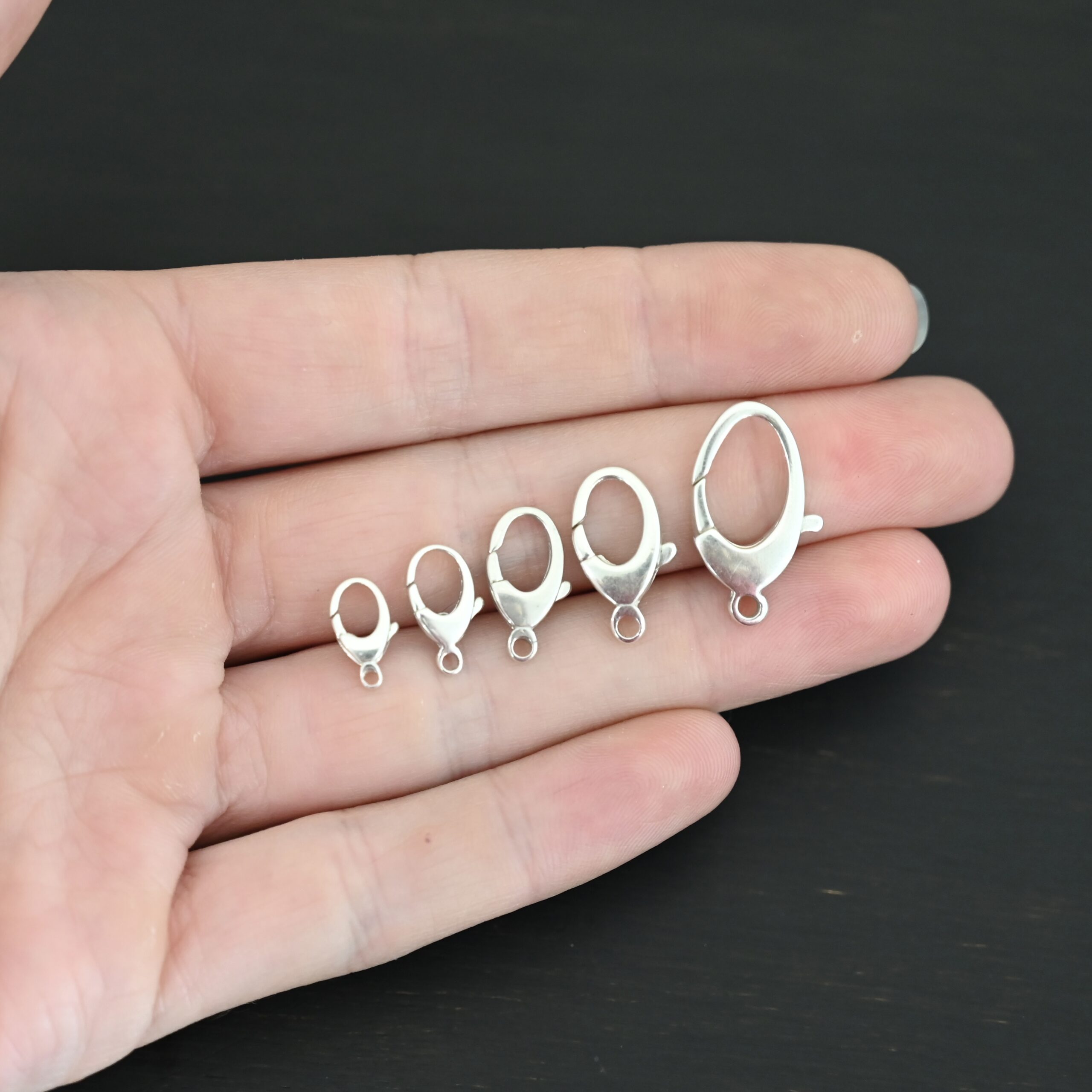 Luna Lobster Claw Clasp - shiny shown in hand