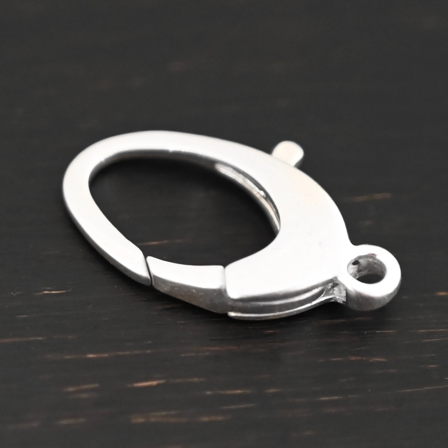 Luna Lobster Claw Clasp - shiny shown on dark background