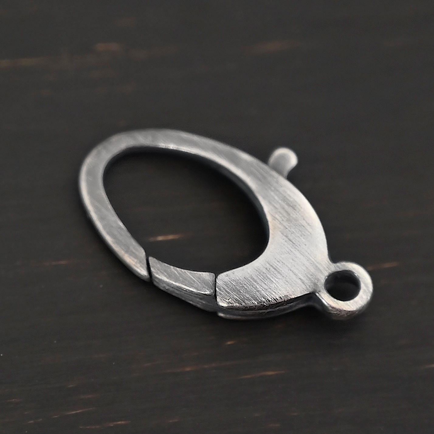 Luna Lobster Claw Clasp - oxidized shown on dark background